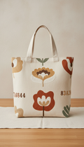 Cream linen motif tote bag